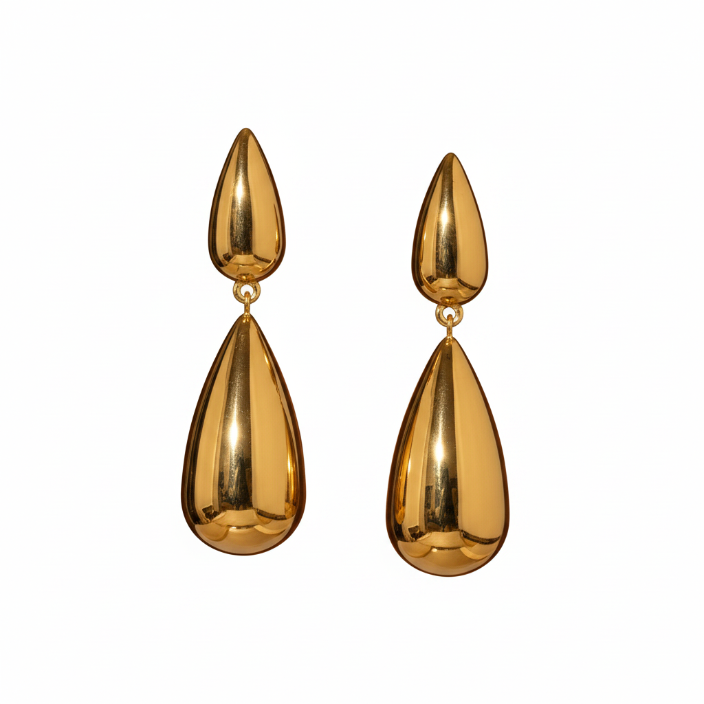 Brincos Goutte — flat-lay ouro