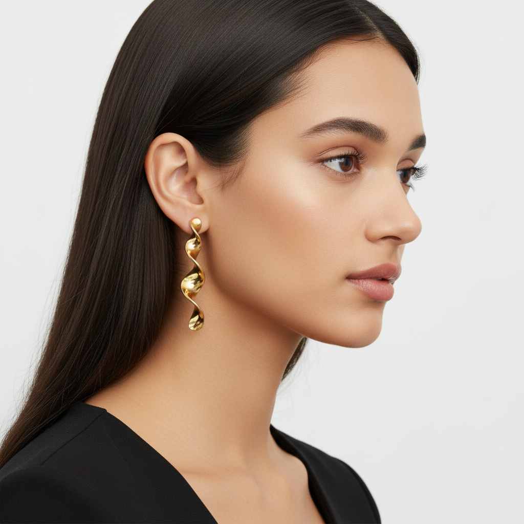 Brincos Torsade — modelo dourado