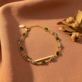 Pulseira Jade Gold — flat lay